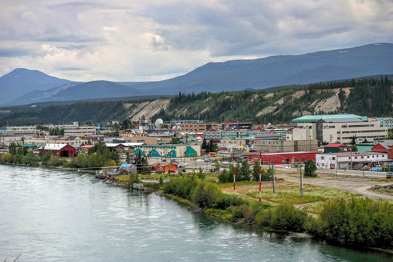 Yukon River at Whitehorse (verified Yukon landscape; representative safety/travel context, not a highway sign)